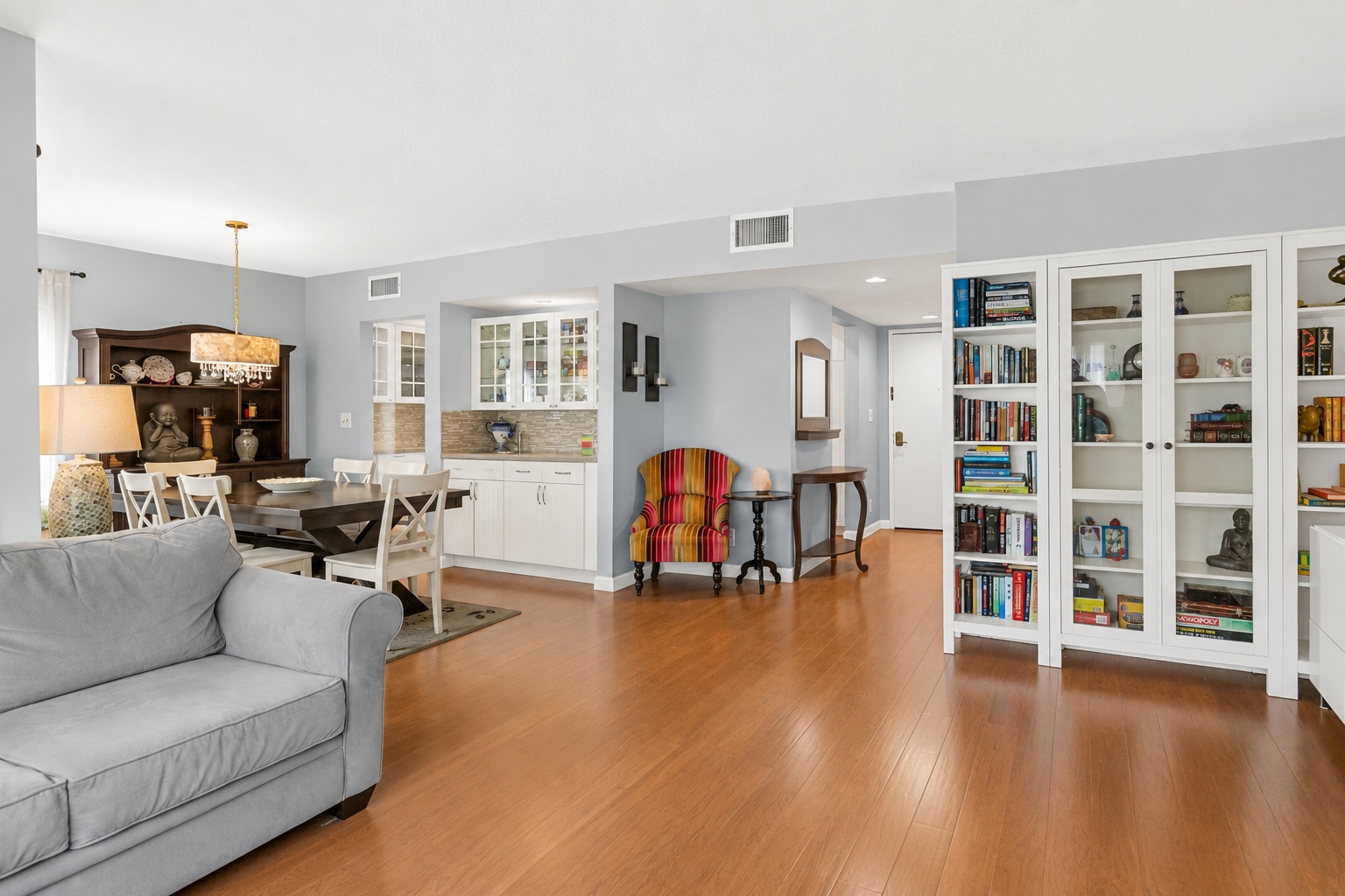 Living and dining areas looking back toward entry