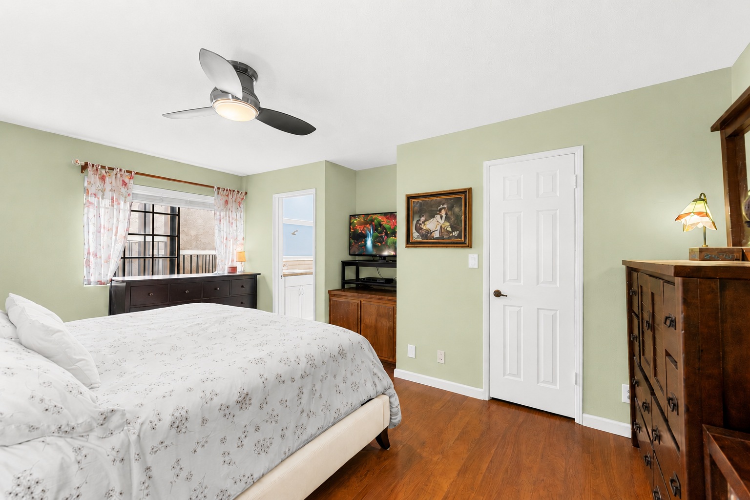 Primary bedroom with walk-in closet